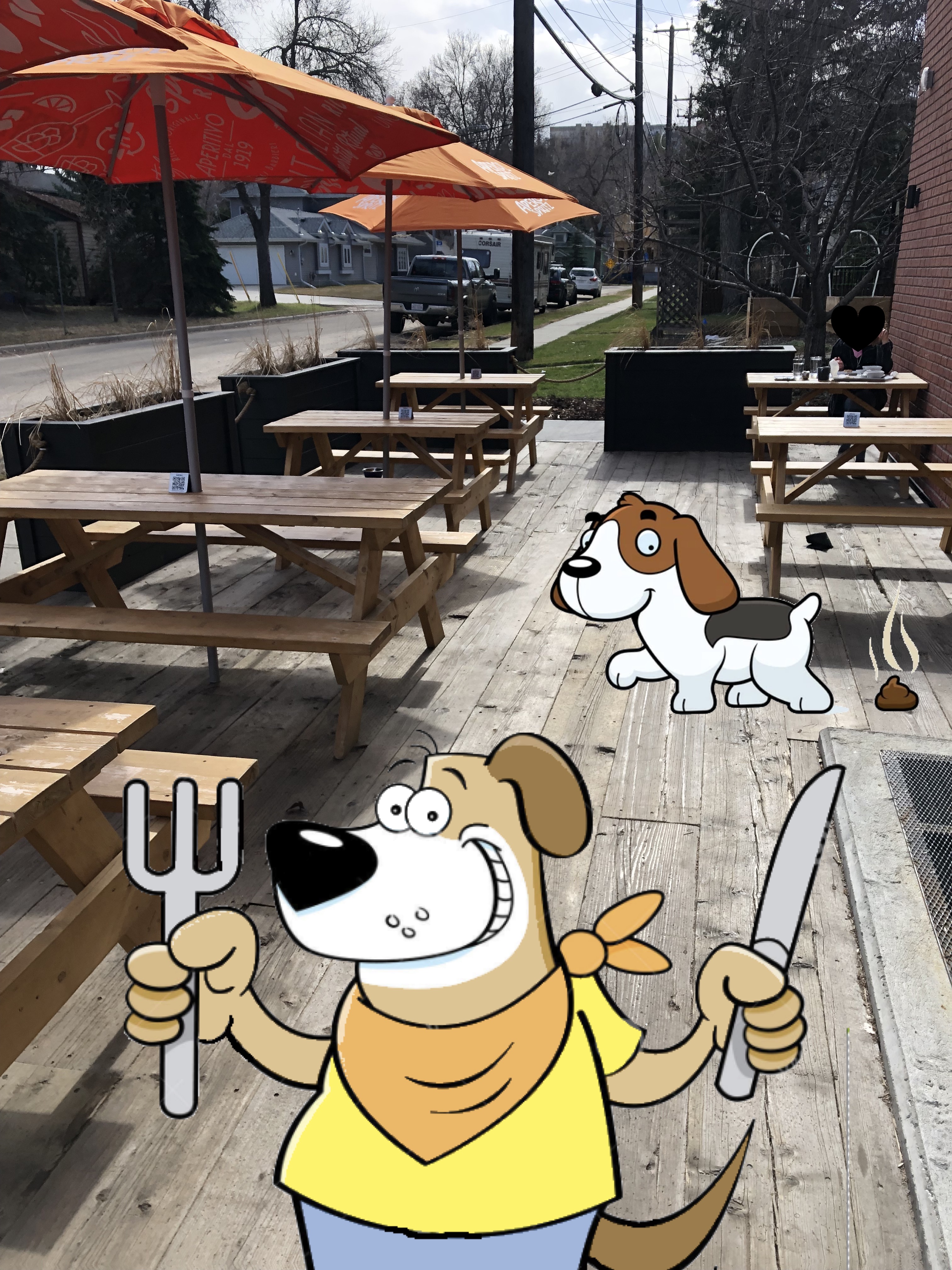 The patio at the restaurant with a cartoon dog who is holding a fork and knife. Another cartoon dog poops. 