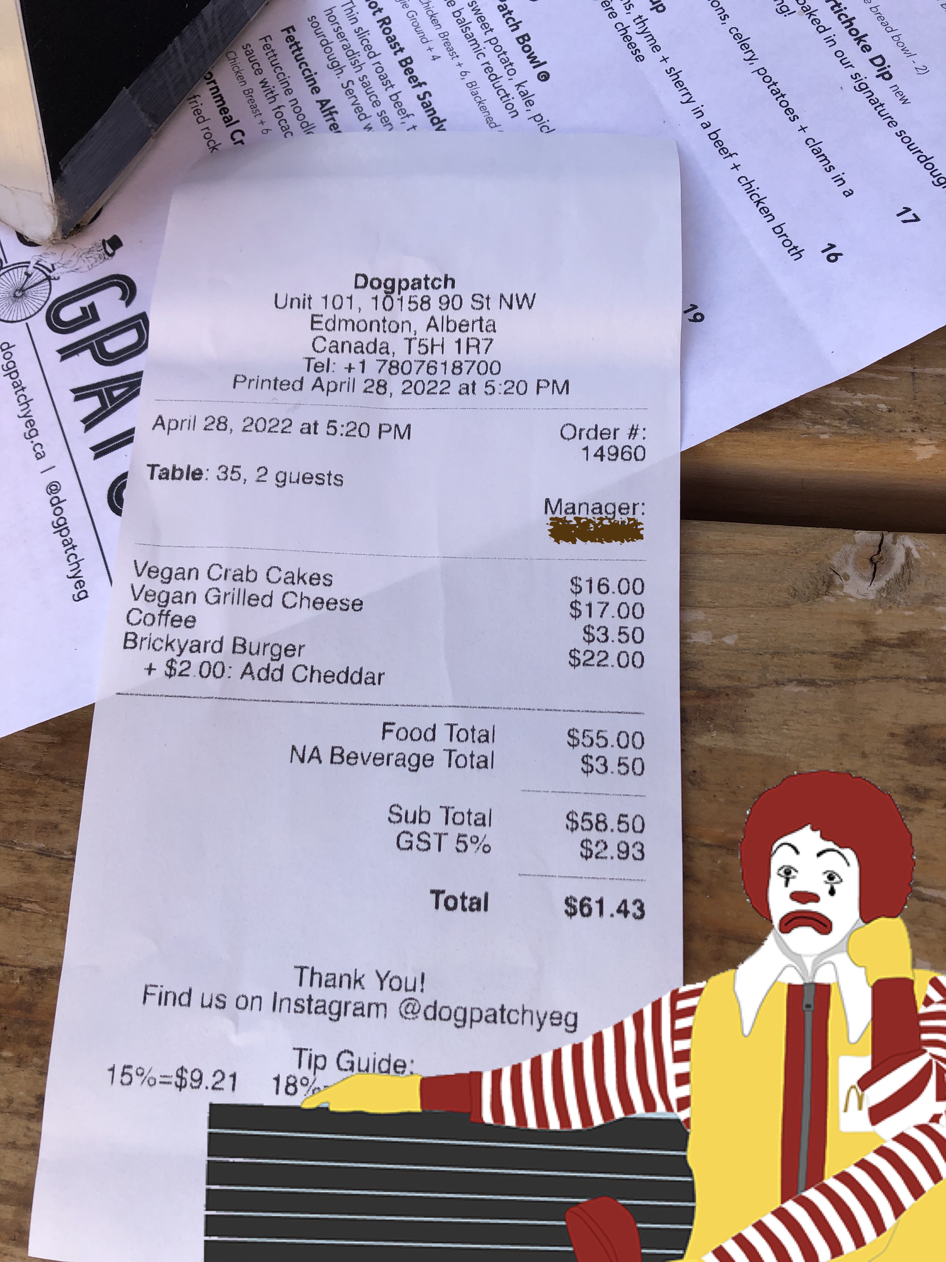 The bill for our meal, which is 61.43 dollars. Ronald Mcdonald looks outraged. 