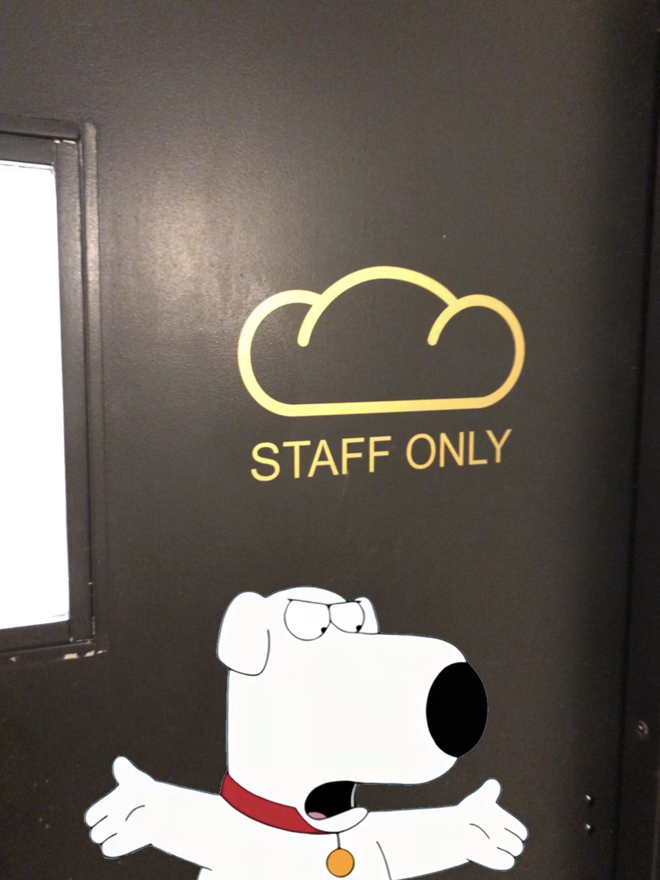 A door with a Loaf of Bread symbol on it, that sort of looks like a turd. A dog looks outraged. 