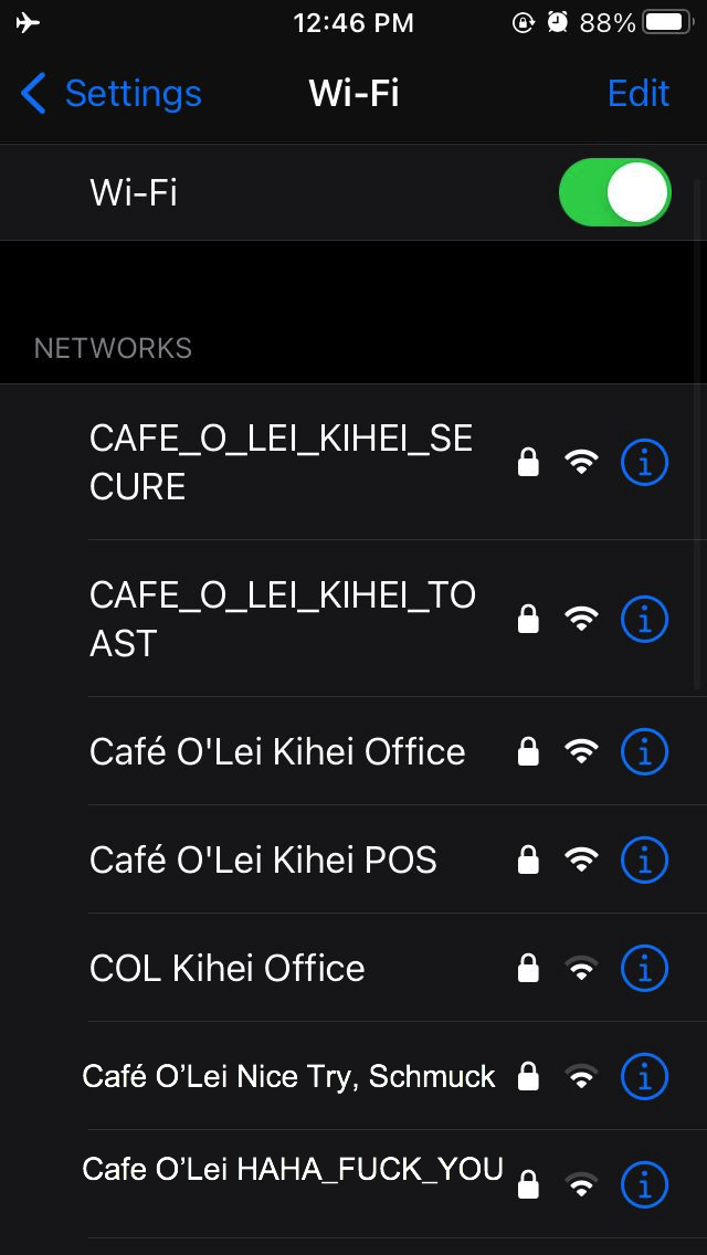 Wi-Fi Networks on cell-phone: 5 Networks for Cafe O'Lei. 2 extra networks: "Nice try, schmuck" and "HAHA FUCK YOU." 