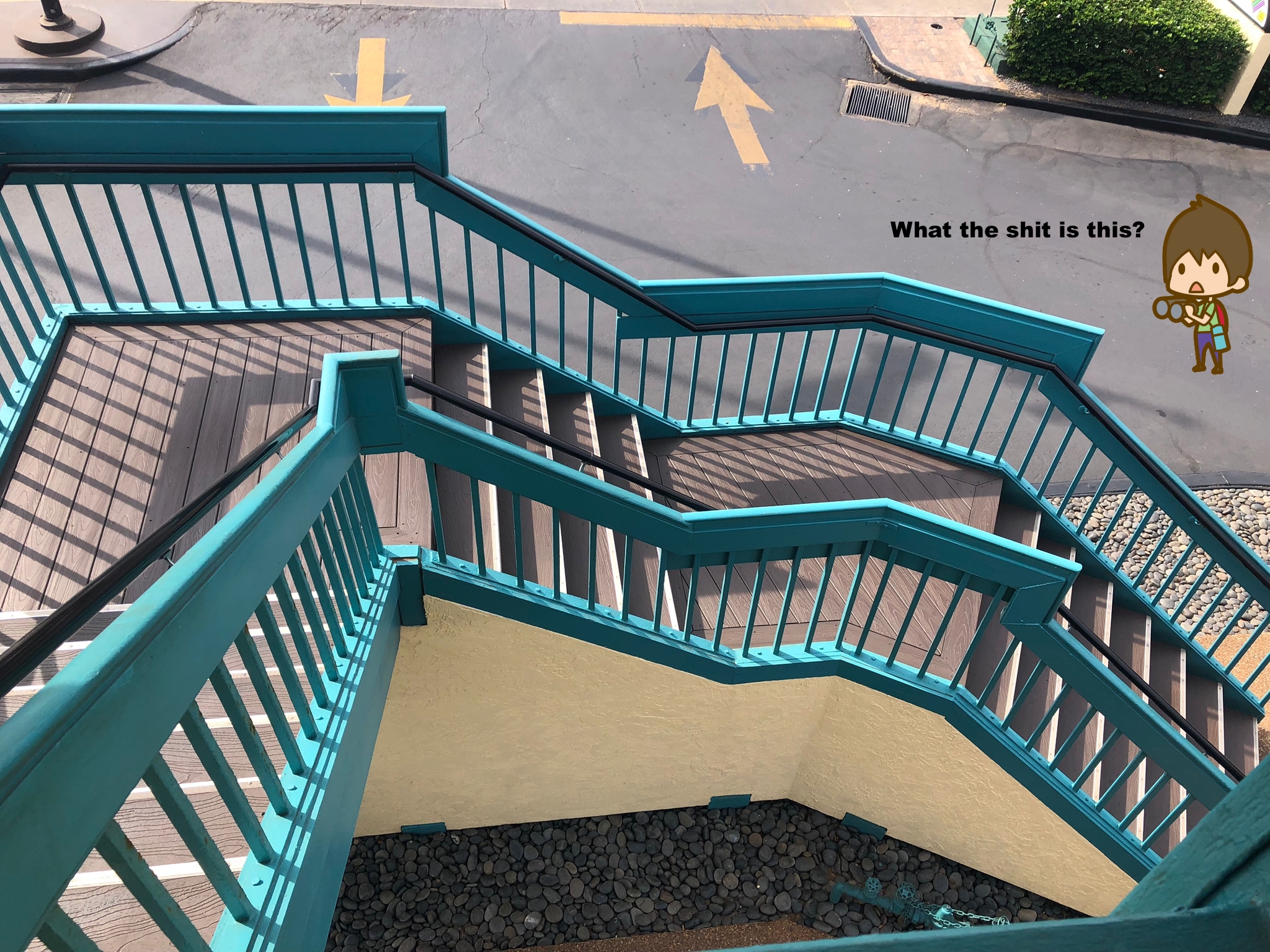 Turquoise / teal staircase outside the cafe. A tiny man is at the bottom with binoculars. 